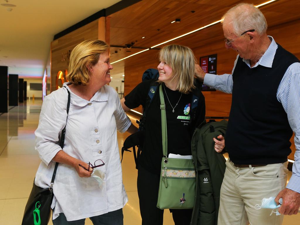 Fiona Robertson and Bruce Robertson with their daughter Elle at the International Terminal at Sydney Airport. Picture: Gaye Gerard / NCA Newswire