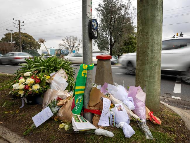 Tributes at the scene of the crash. Picture: Mark Stewart