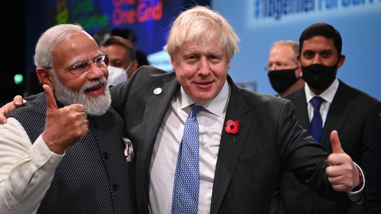 A new hope. India's Prime Minister Narendra Modi and Britain's Prime Minister Boris Johnson on day three of COP26. Picture: Jeff J Mitchell/Getty Images