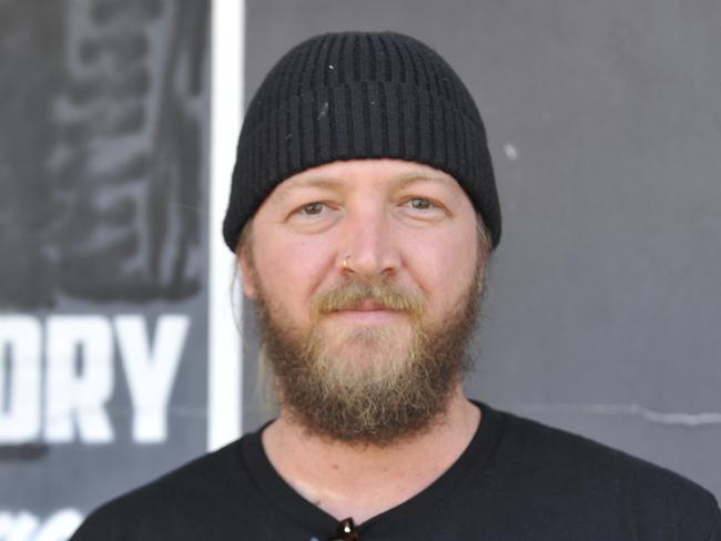 Dustin Bowie-Ford outside Woolgoolga's Box Factory Burgers. The shop is giving away free soft-serve ice cream throughout the lockdown with any phone order. Photo: Tim Jarrett