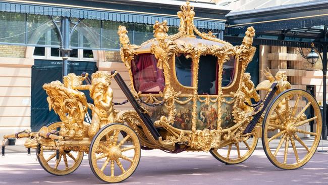 The Gold State Coach at the Royal Mews at Buckingham Palace. Picture: Getty Images