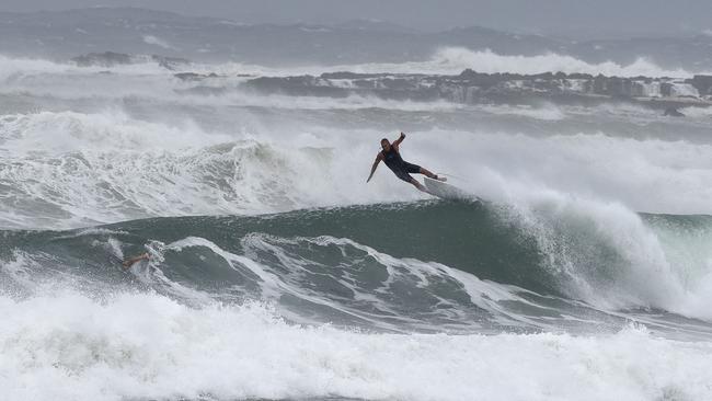 A surfer falls from his board at Kirra on Sunday. Picture: NCA NewsWire/Steve Holland