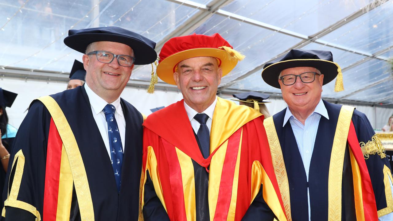 Deakin University vice chancellor Iain Martin, honorary doctorate recipient Bob Gartland and Chancellor John Stanhope. Picture: Alison Wynd