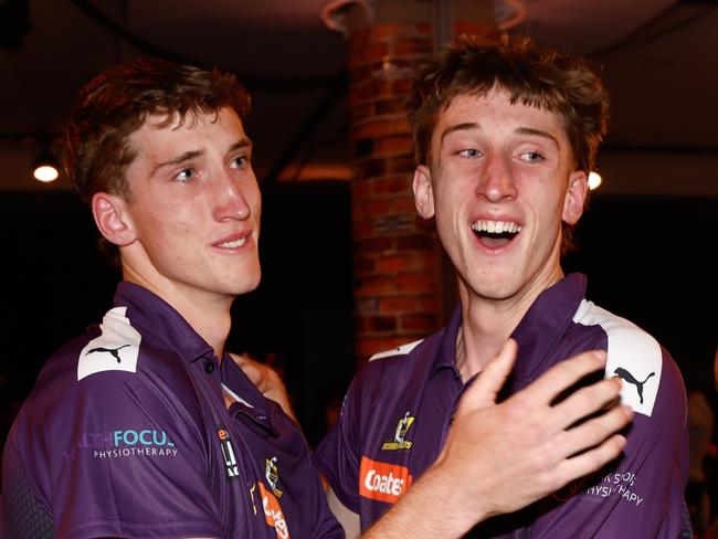 Jack Whitlock celebrates with his twin brother Matt. Picture: Michael Willson/AFL Photos via Getty Images