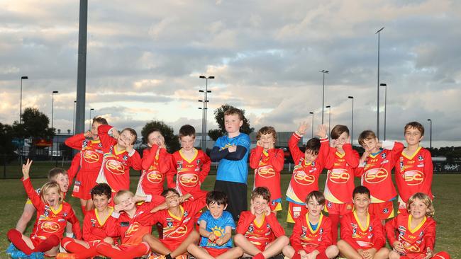 Surf Coast Suns Front Beach under-9 football team pull their funniest faces. Picture: Alison Wynd