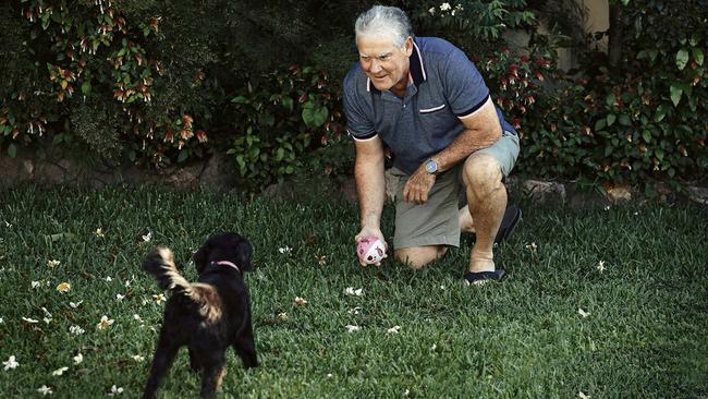 Gary Diggles with his pet cavoodle Dotti. Picture: Justine Walpole