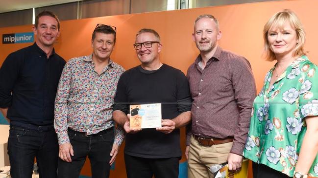 Yves Stening (centre) accepting his award. Picture: 360media/Yann Coatsaliou