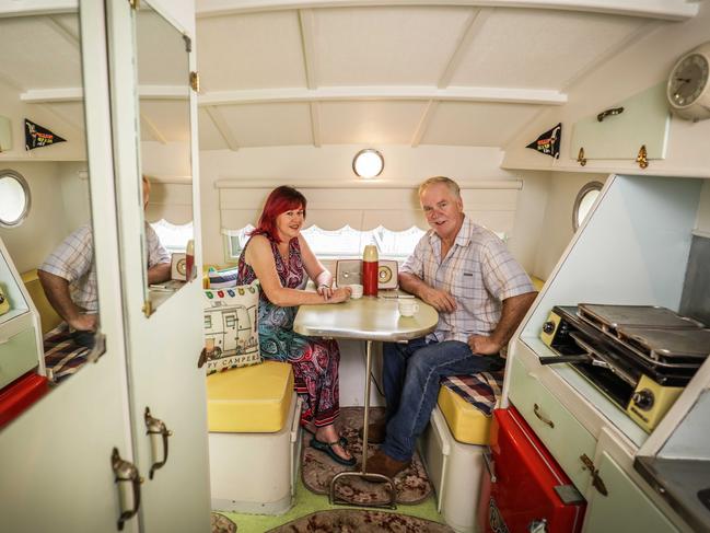 Denise and Peter Jensen enjoy a cuppa in their renovated 1955 Playtime van. Picture: Nicole Cleary