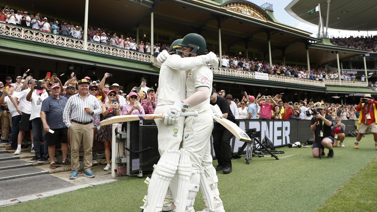 Usman Khawaja and David Warner embrace before Warner's last Test match innings. Picture: Getty