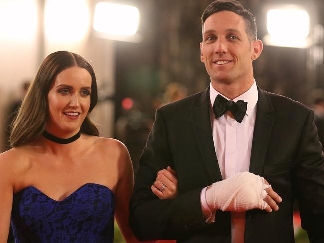 Harry Taylor, pictured with wife Michelle Taylor, accessorised with a bandage for his injured hand at last year’s Brownlow. Picture: Wayne Ludbey