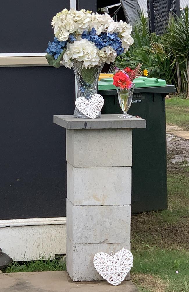 Flowers are laid in the wake of a fatal stabbing in Casino on Sunday. Picture Cath Piltz