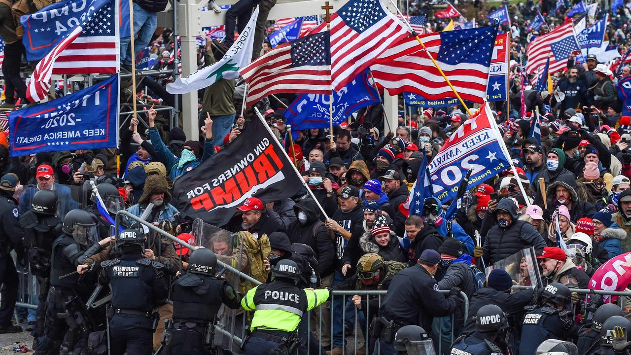 Trump supporters clash with police and security forces as they storm the US Capitol in Washington. Picture: Roberto Schmidt/AFP