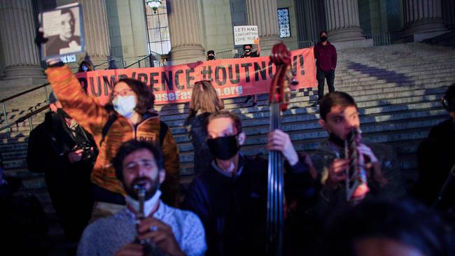 A band plays in respect of Justice Ginsburg outside the New York State Civil Supreme Court on Saturday. Picture: AFP