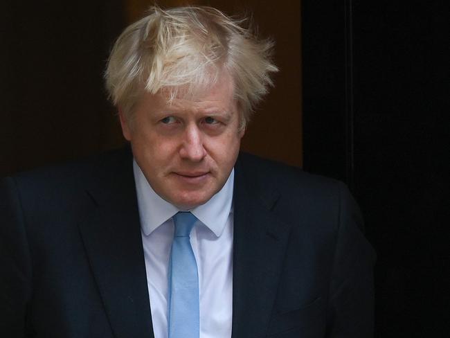 TOPSHOT - Britain's Prime Minister Boris Johnson comes out to greet Israel's Prime Minister Benjamin Netanyahu outside 10 Downing Street in central London on September 5, 2019. - UK Prime Minister Boris Johnson called Thursday for an early election after a series of votes in parliament tore up his hardline Brexit stance and left him without a majority. (Photo by DANIEL LEAL-OLIVAS / AFP)