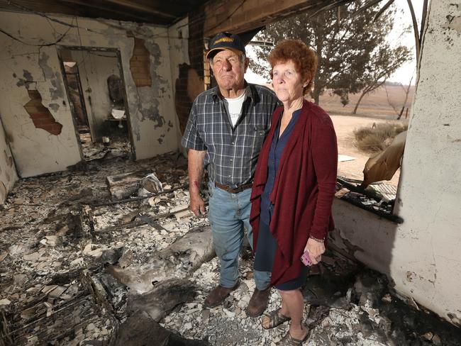 RUBBLE: David ‘Joey’ and Barb Schuster at what was left of their of their Freeling home yesterday. Picture: TAIT SCHMAAL