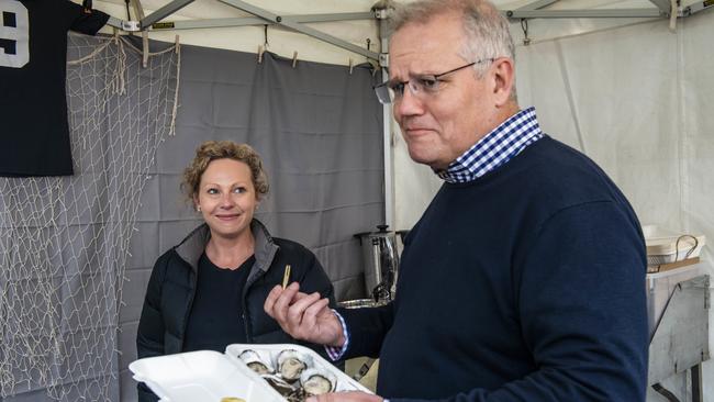 Prime Minister Scott Morrison trying Bruny Island Oysters during his recent visit to Hobart. (AAP Image/Chris Crerar)