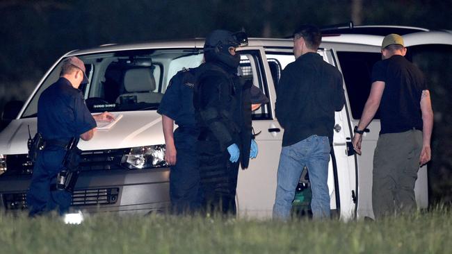 A bomb squad member at the shooting scene. Picture: Mike Keating