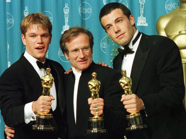 Damon, Williams and Affleck with their Oscars for <i>Good Will Hunting.</i>