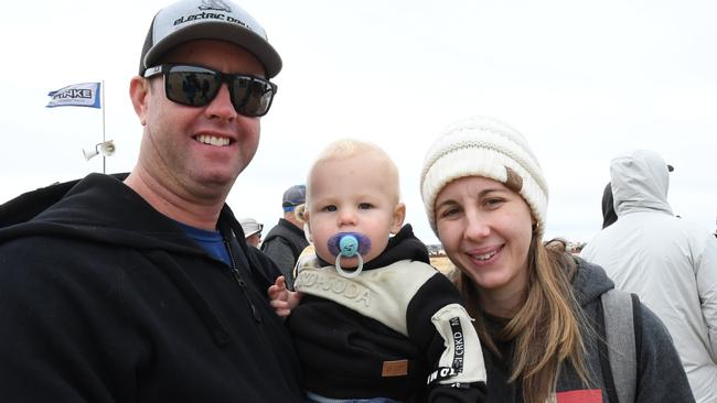 Parents Dean and Alana Murphy with baby Nate at Finke Desert Race 2022. Picture: (A)manda Parkinson