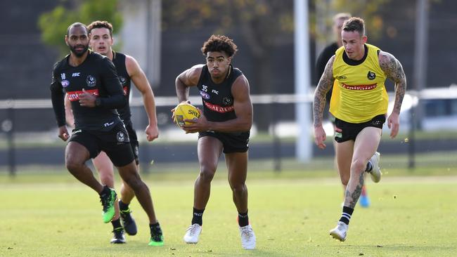 Quaynor bursts through during a 2019 training session. Picture: AAP Image/Julian Smith