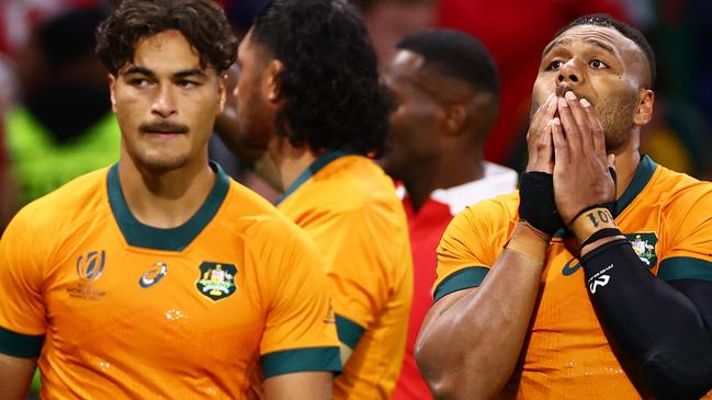 LYON, FRANCE - SEPTEMBER 24: Jordan Petaia and Samu Kerevi of Australia look dejected at full-time following the Rugby World Cup France 2023 match between Wales and Australia at Parc Olympique on September 24, 2023 in Lyon, France. (Photo by Chris Hyde/Getty Images)