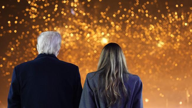 US president-elect Donald Trump and his wife Melania Trump watch fireworks during a reception in his honour at Trump National Golf Club Washington DC in Sterling, Virginia, on January 18. Picture: AFP