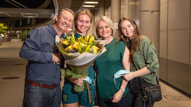 Ariarne Titmus with parents Steve and Robin and sister Mia after the 2021 Olympics. PICTURE: Brad Fleet