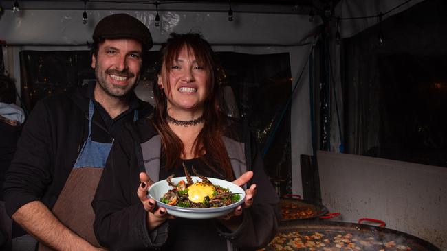 The City of Hobart Winter Feast. Kiltro owners Andrea Comino and Caro Montero with their Dark Paella dish. Picture: Linda Higginson