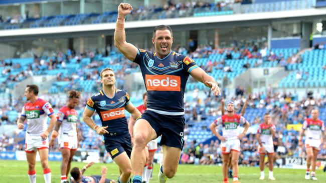 Michael Gordon of the Titans celebrates scoring a try during the round 6 NRL match between the Titans and the Knights at Cbus Super Stadium on April 21. (Photo by Bradley Kanaris/Getty Images)