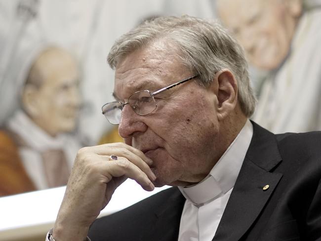 Cardinal George Pell attends a press conference at the Vatican Radio headquarters, in Rome, Tuesday, March 31, 2015. The Vatican finance minister has said he hopes to avoid financial scandal with the upcoming Jubilee year, saying the plans will be subject to new Vatican procedures to ensure they follow international standards for transparency and accountability. Cardinal George Pell outlined the Vatican's financial reform during a conference Tuesday to launch a book on better managing church assets, a priority for Pope Francis after years of financial scandal and mismanagement at the Holy See. (AP Photo/Andrew Medichini)