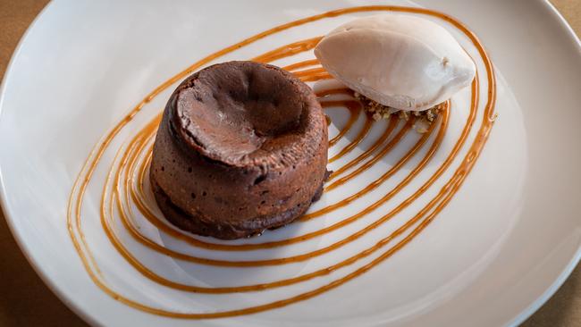 The chocolate fondant with caramel sauce. Picture: Tim Bradley