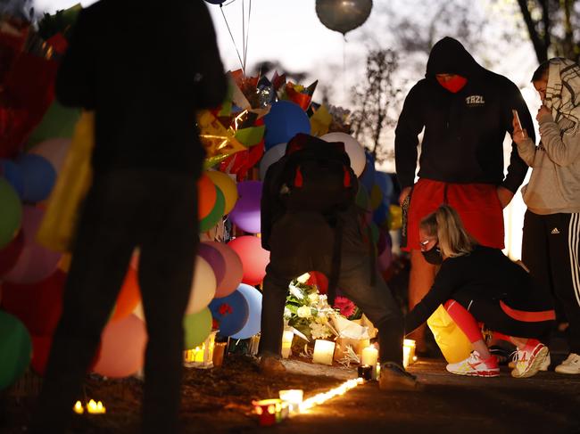 A temporary memorial remains at the Doonside home where he died. Picture: Jonathan Ng