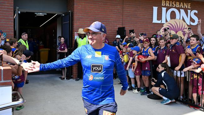 IPSWICH, AUSTRALIA - SEPTEMBER 24: Chris Fagan, Senior Coach, greets fans during a Brisbane Lions AFL training session at Brighton Homes Arena on September 24, 2024 in Ipswich, Australia. (Photo by Bradley Kanaris/Getty Images)