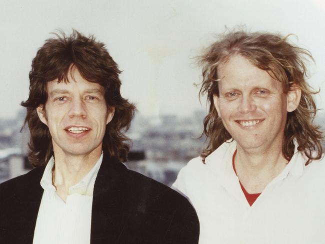 Author Stuart Coupe with Mick Jagger from his Shake Some Action memoir. Picture: Supplied.