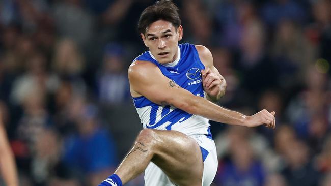 MELBOURNE, AUSTRALIA - MAY 04: Zac Fisher of the Kangaroos kicks the ball during the 2024 AFL Round 08 match between the St Kilda Saints and the North Melbourne Kangaroos at Marvel Stadium on May 04, 2024 in Melbourne, Australia. (Photo by Michael Willson/AFL Photos via Getty Images)