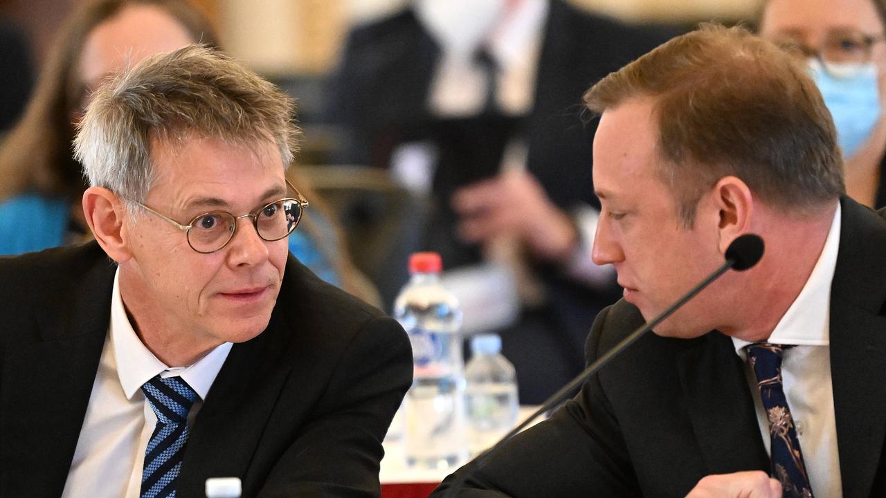 Mike Kaiser with Steven Miles during a estimates hearing at Parliament. Picture: NCA NewsWire / Dan Peled