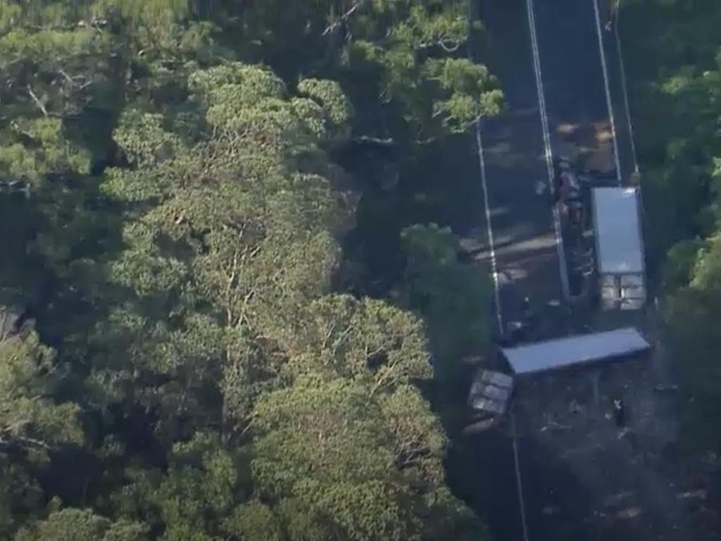 Drone footage shows the scene of a double fatal truck rollover on the Cunningham Highway at Tregony. Images: ABC News