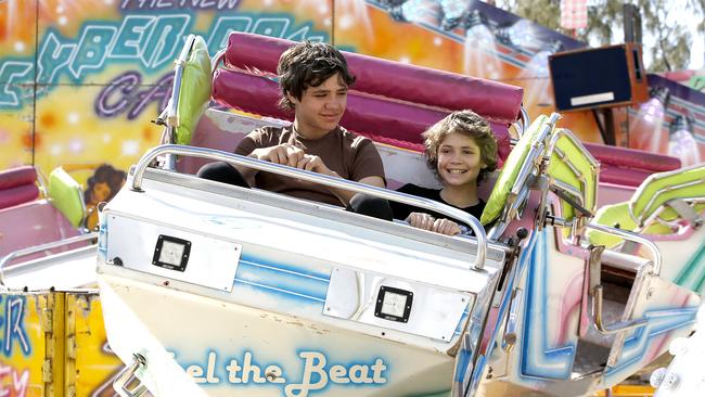 Leo Metcalf, 12, and Asher Metcalf, 10, enjoy the Cyber Party ride at the Gold Coast Show held the Broadwater Parklands, Gold Coast, Sunday, September 3, 2023. Photo: Regi Varghese