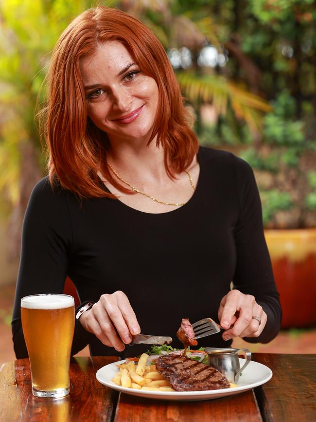 Rene Peniata dines on a $13 steak meal at Rooty Hill’s Carousel Inn. Picture: Justin Lloyd