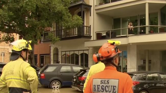 Emergency services unblocked a drain to help the water subside. Picture: 7 NEWS