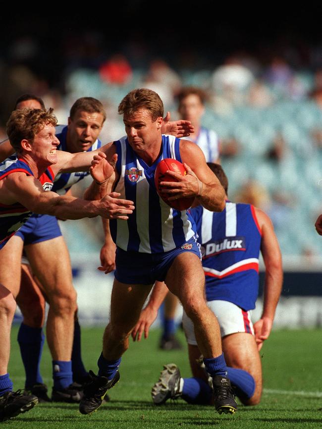 Mathew Armstrong on the burst for North Melbourne.