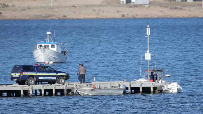 Triabunna Shark Attack: Forensic Police remove the body a diver fatally attacked by a shark off the coast of Triabunna on Tasmania's East Coast BYLINE: LUKE BOWDEN