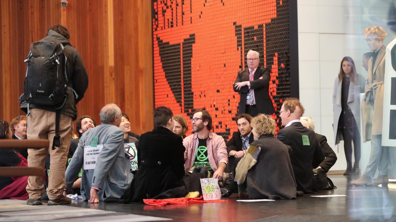 Protesters invaded the lobby of GHD, an engineering company associated with Adani. Picture: John Grainger