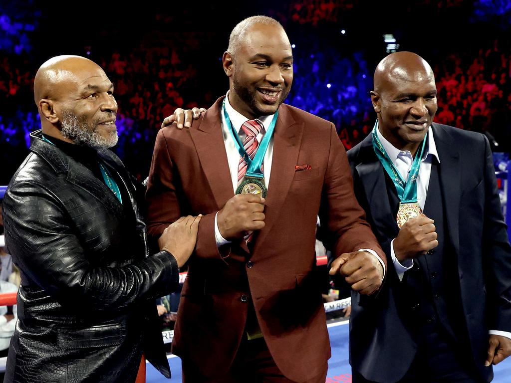 Mike Tyson with fellow legends Lennox Lewis and Evander Holyfield at the Deontay Wilder-Tyson Fury fight earlier this year. (Photo by Al Bello/Getty Images)