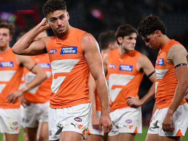 MELBOURNE, AUSTRALIA - MAY 11: The Giants look dejected after the round nine AFL match between Essendon Bombers and Greater Western Sydney Giants at Marvel Stadium, on May 11, 2024, in Melbourne, Australia. (Photo by Daniel Pockett/AFL Photos/via Getty Images)