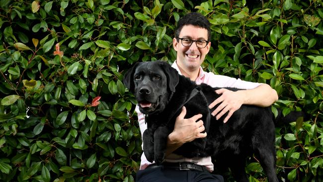 Speaker Dan Cregan with his dog Ted, a black lab. Picture: Tricia Watkinson