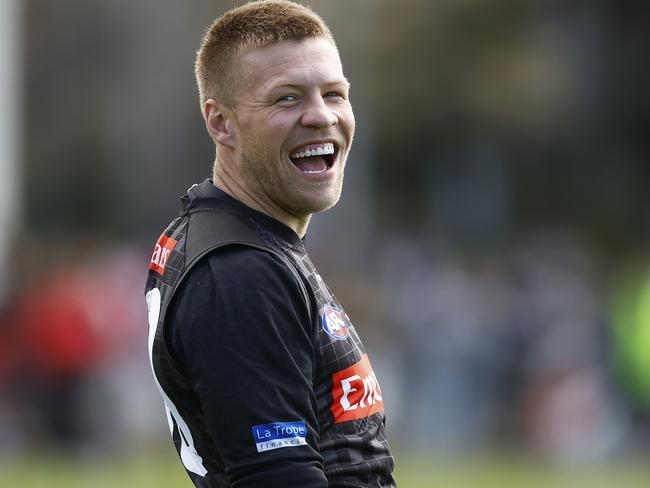 MELBOURNE, AUSTRALIA - SEPTEMBER 15: Jordan De Goey of the Magpies laughs during a Collingwood Magpies AFL training session at Olympic Park Oval on September 15, 2022 in Melbourne, Australia. (Photo by Daniel Pockett/Getty Images)