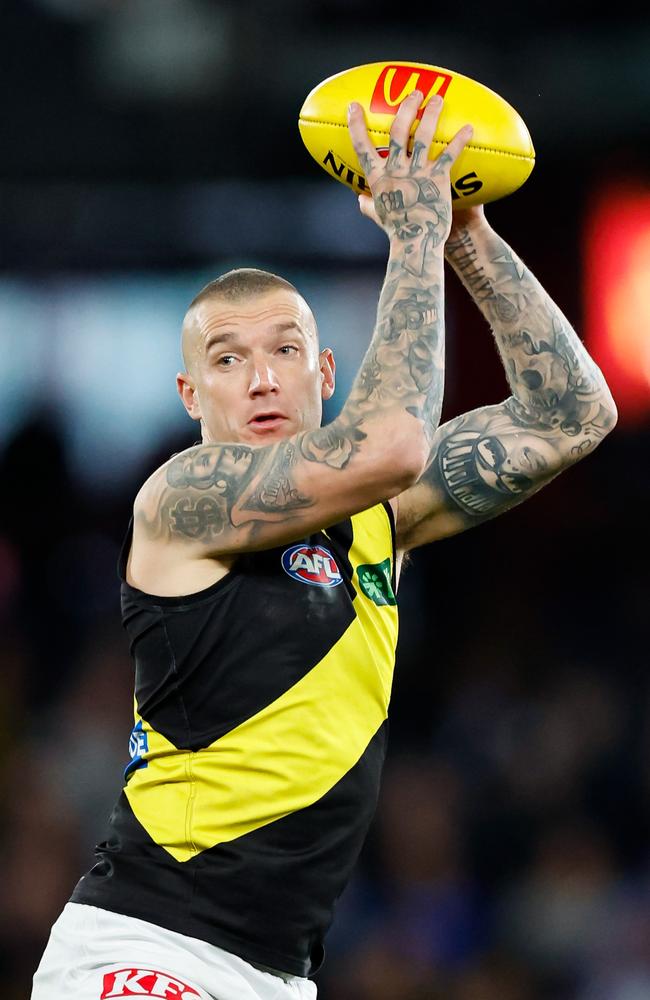 ‘He has done it in true Dusty Martin style!’ Tigers superstar Dustin Martin also announced his retirement on Tuesday, the same day as Hawkins did. Picture: Getty Images