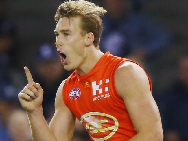 MELBOURNE, AUSTRALIA - APRIL 15:  Tom Lynch of the Suns celebrates a goal during the round four AFL match between the Carlton Blues and the Gold Coast Suns at Etihad Stadium on April 15, 2017 in Melbourne, Australia.  (Photo by Michael Dodge/Getty Images)