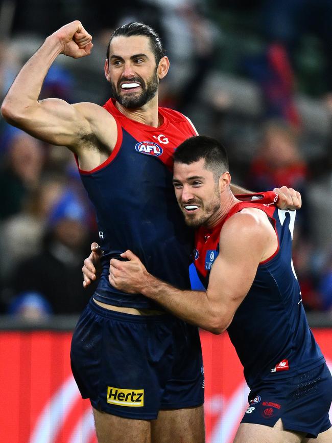 Melbourne’s Brodie Grundy celebrates a goal with Alex Neal-Bullen after kicking a goal against his former side, Collingwood on the King’s Birthday. Picture: Quinn Rooney/Getty Images